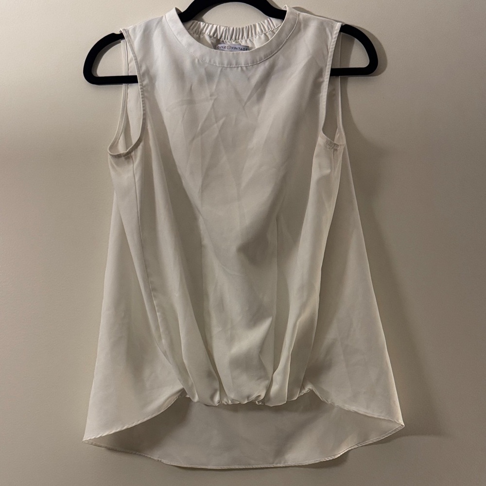 Elegant Sleeveless Ivory Blouse